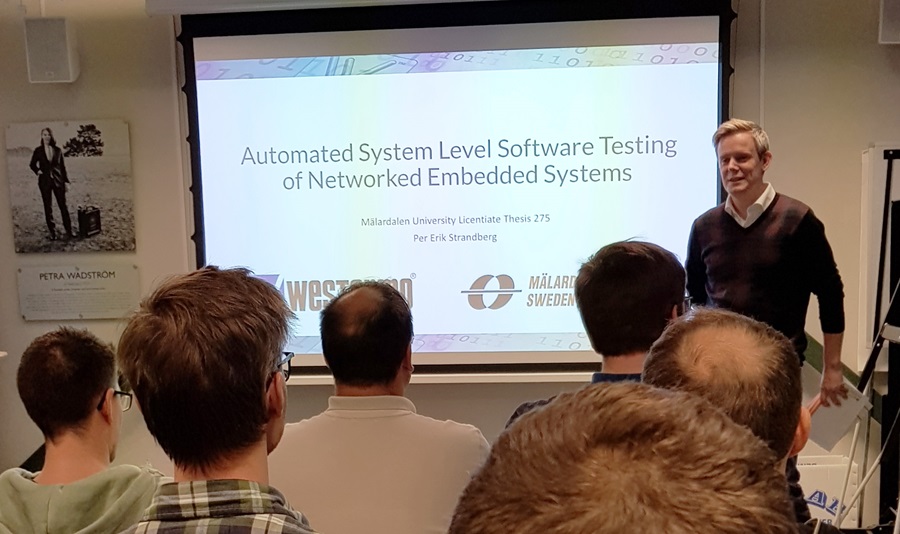 Per Erik Strandberg presenting his thesis work for Westermo employees. 