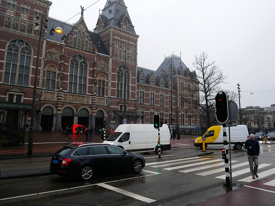Intersection with traffic lights outside Rijksmuseum in Amsterdam.