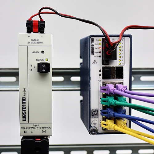 Image of a Westermo Power Supply unit PS260 wired up to a Ethernet switch Lynx-3510